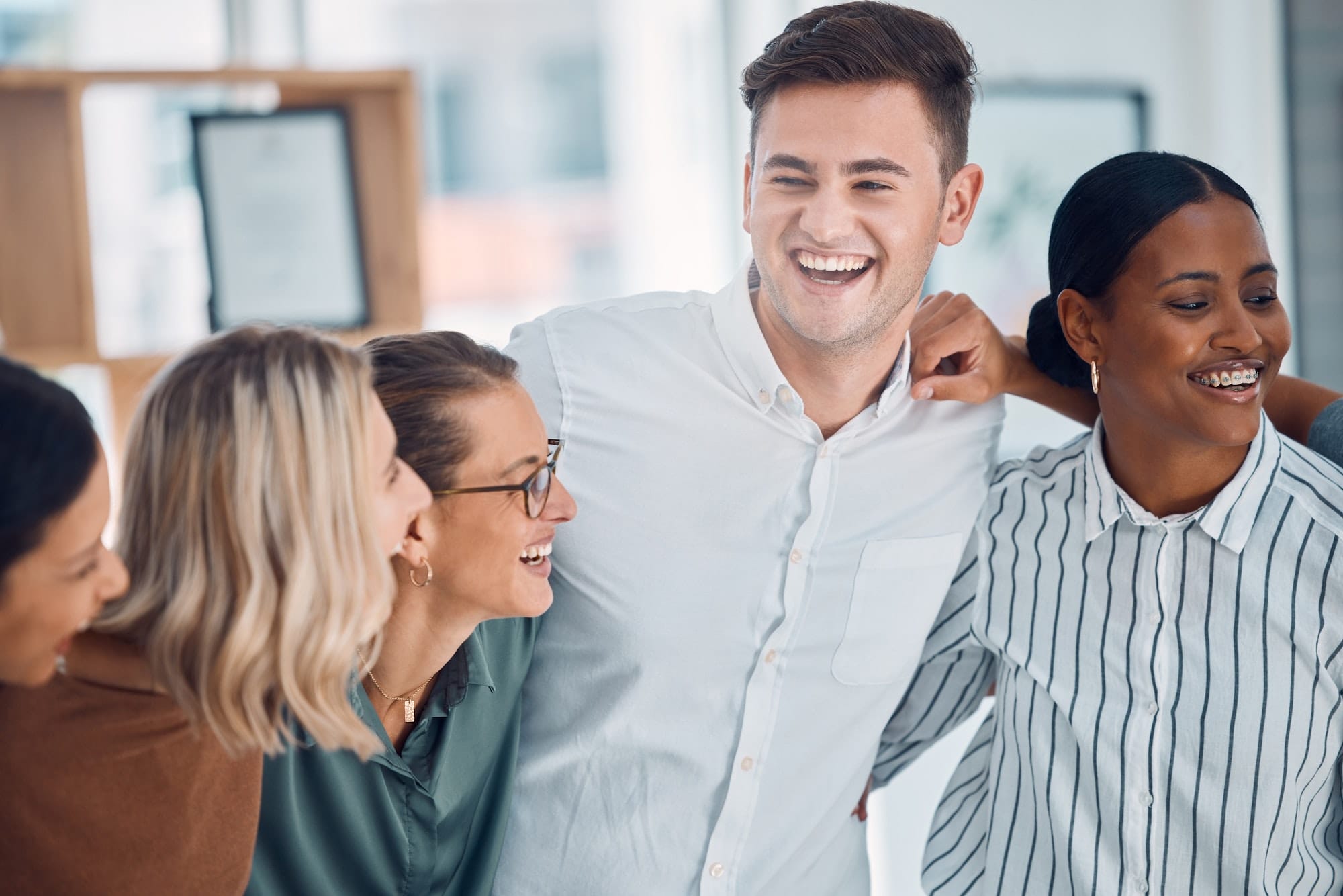 Business people, laughing or team building diversity in office, company or startup for collaboratio